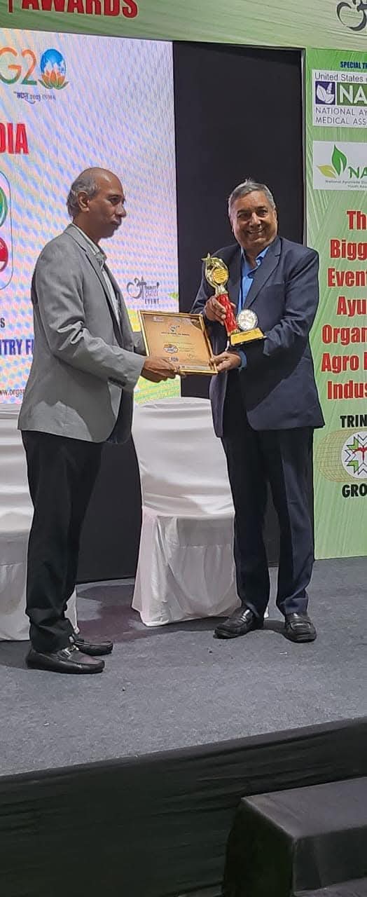 Dr. Laxmidutta Shukla receiving Best of India Business Award at India World Expo Ministry of Ayush